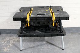 A Ketter folding work bench with vice