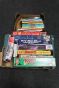 Two boxes of vintage and later board games, jigsaws,