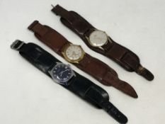 Three gent's watches on vintage leather straps; Sekonda,