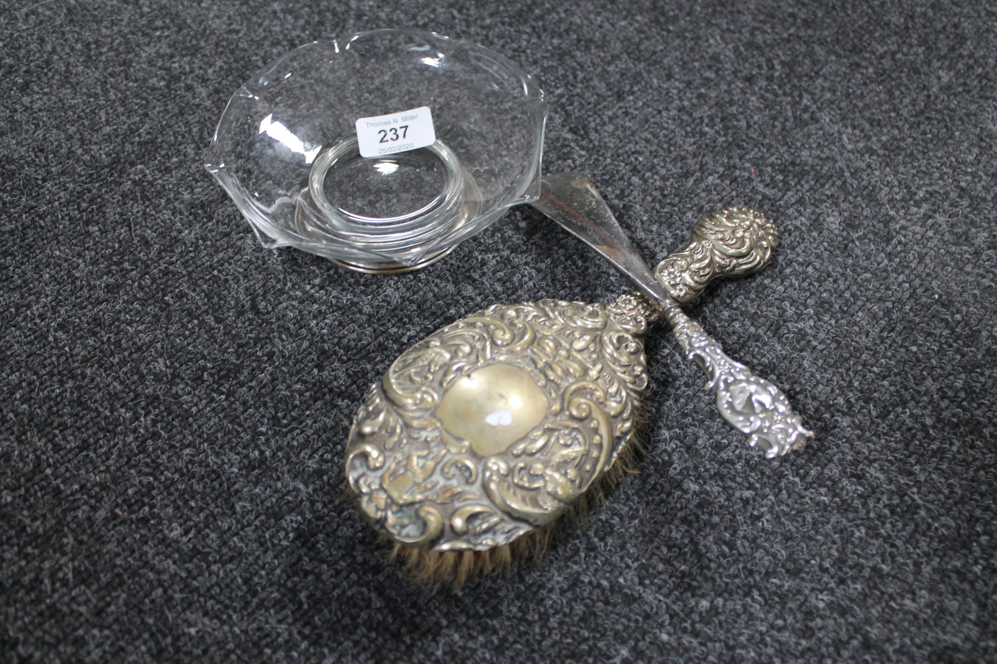 A silver footed glass dish,