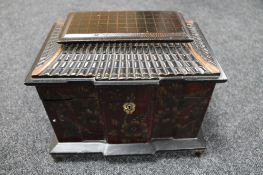 A hand painted jewellery casket in the form of a Chinese pagoda