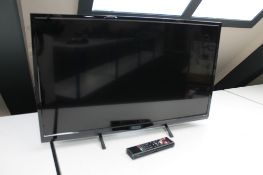 An Seizo 32 inch LCD TV with remote