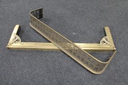 A Victorian brass fire curb together with a Victorian brass fender