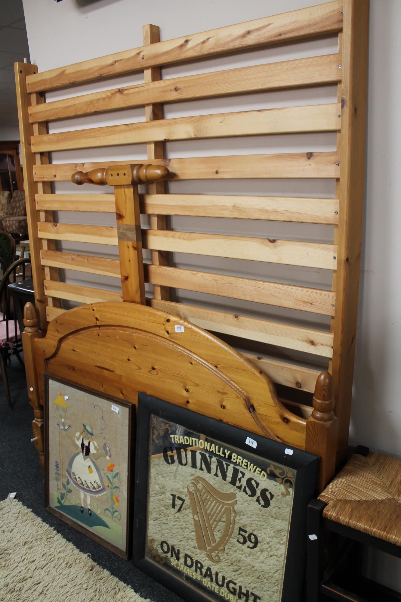 A 4'6"pine bed frame