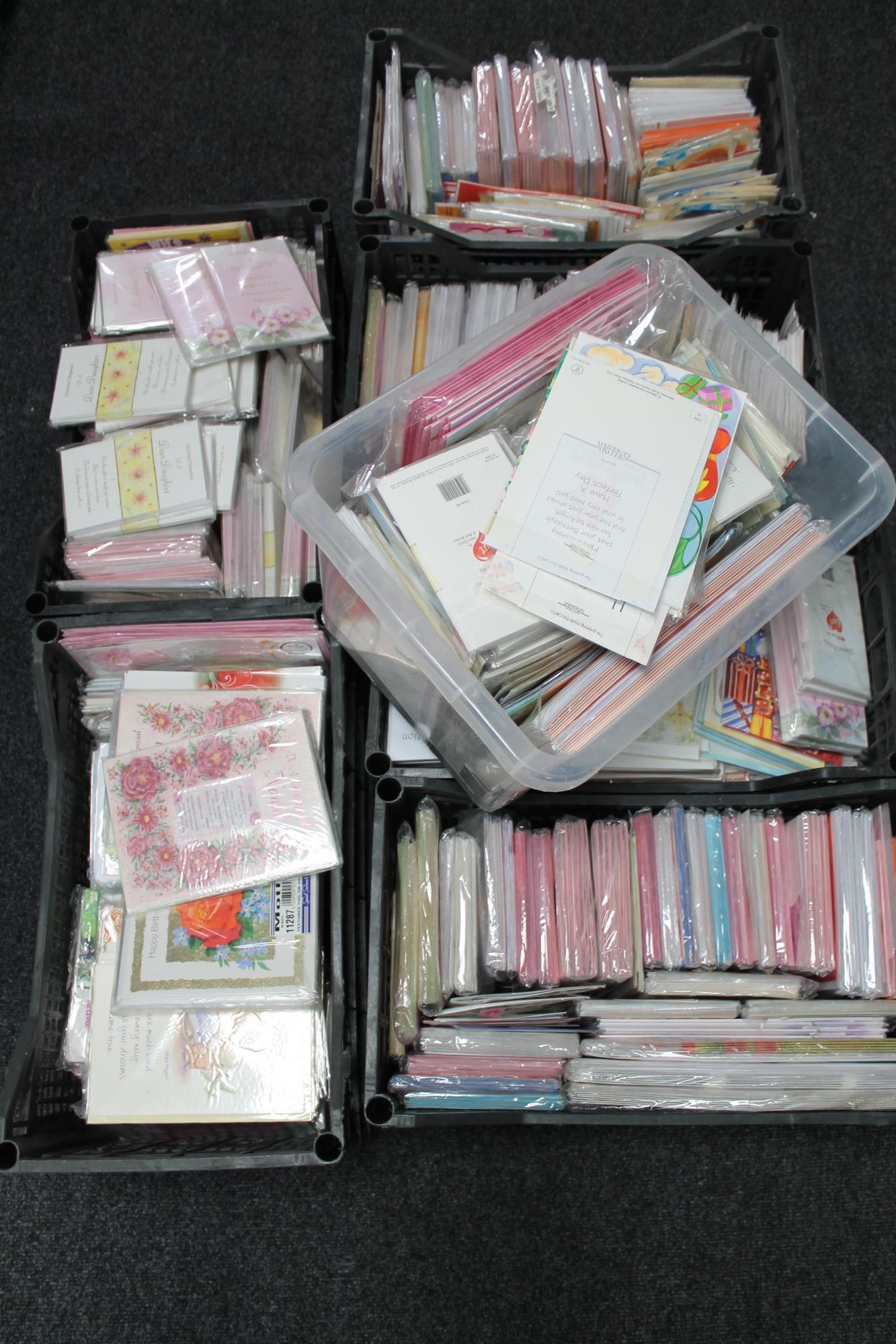 Seven plastic crates of a large quantity of assorted greetings cards