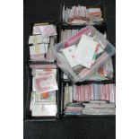 Seven plastic crates of a large quantity of assorted greetings cards