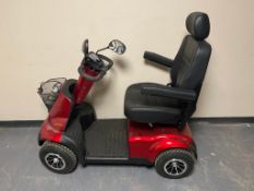 A TGA Faikim mobility scooter, with key, with battery, with charger.