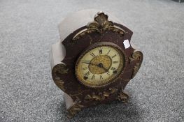 An antique American mantel clock by The L Gilbert Clock Company,