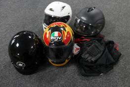 Four motorcycle helmets