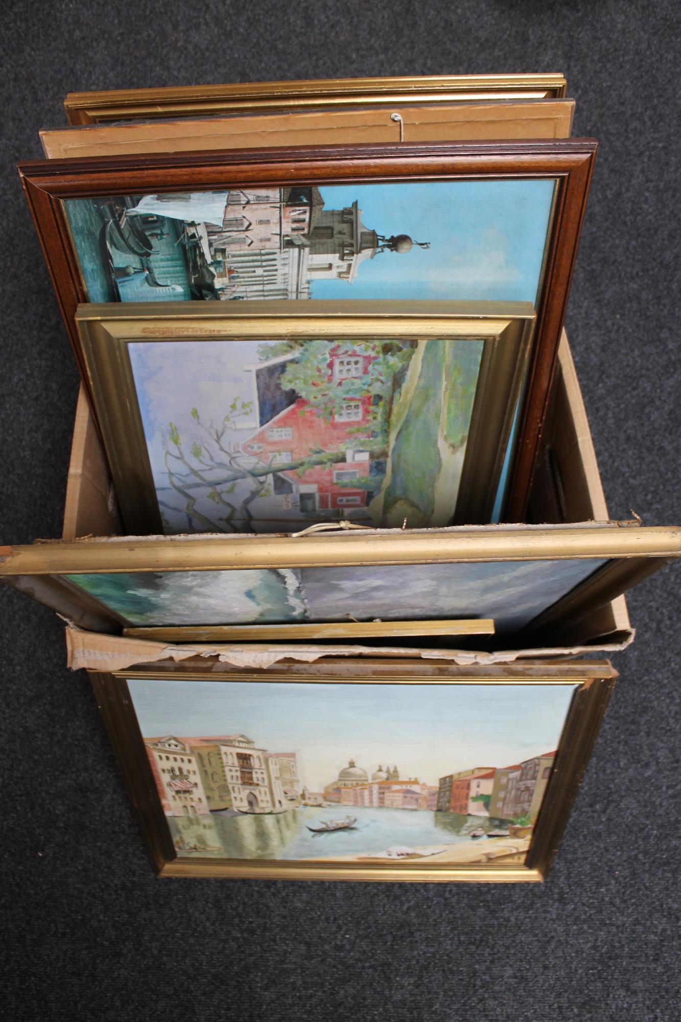 A box of framed and unframed pictures and prints