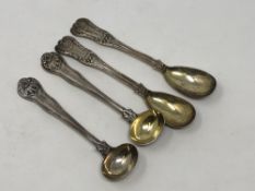 Two pairs of heavy gauge Georgian and William IV silver gilt salt spoons (4)