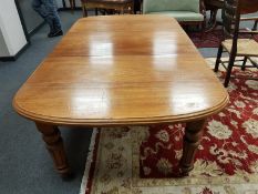 A Victorian mahogany D-end extending dining table, length 210 cm x 123 cm, height 73 cm.