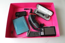 A box of sat nav, Packard Bell external hard drive, Nokia mobile phones,