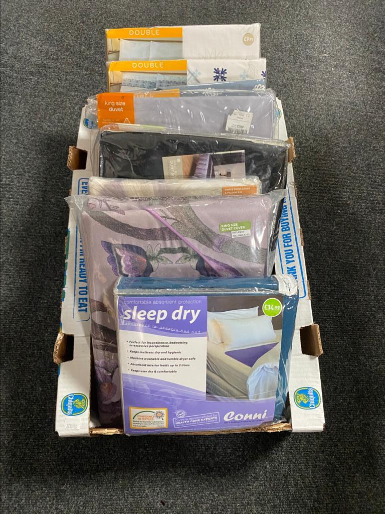 A box of seven new field bed sets, various sizes, including M&S,