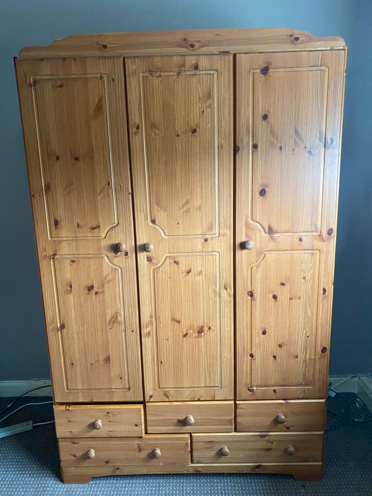 A pine triple door wardrobe fitted five drawers beneath (dismantled) - Image 2 of 2