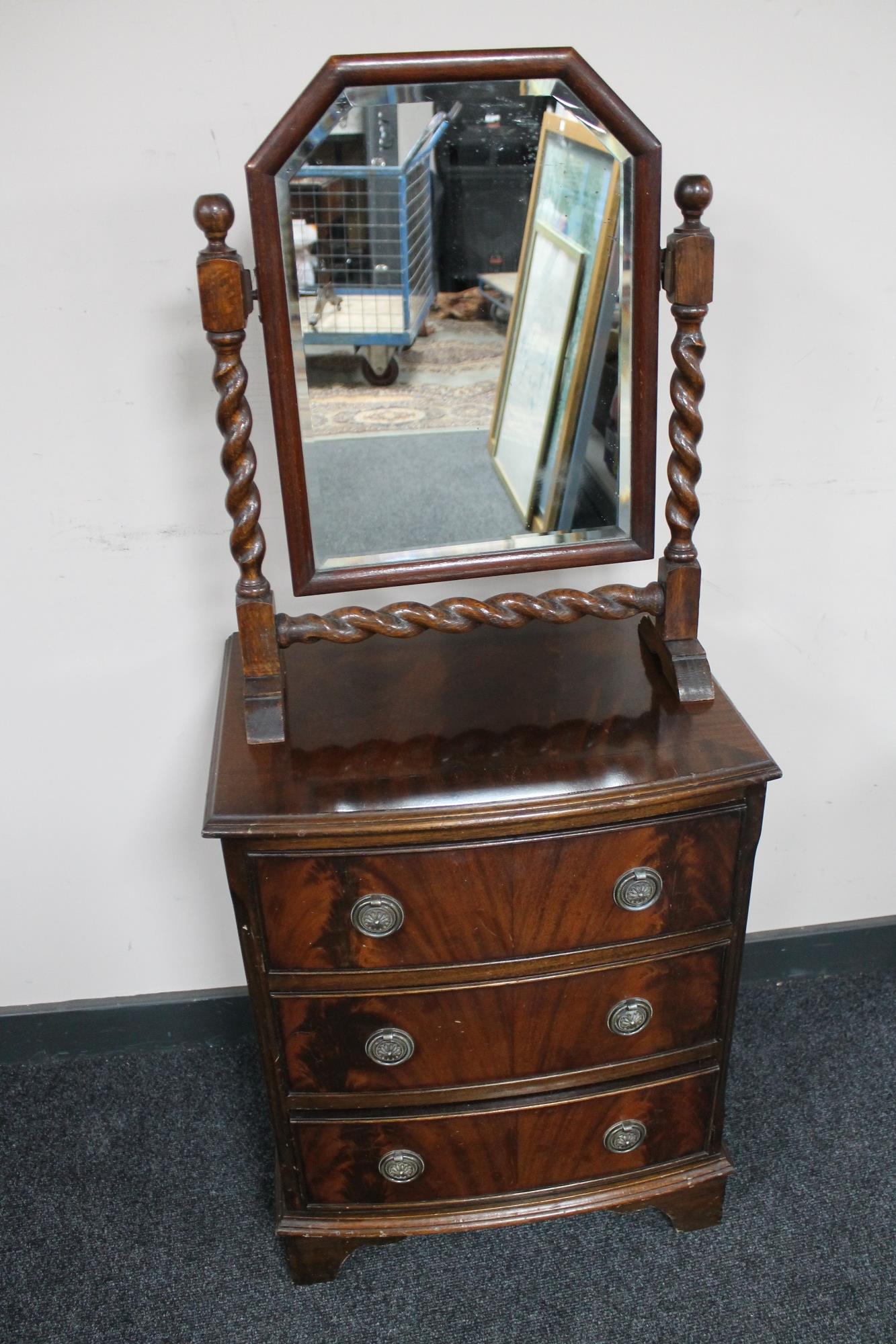 A Regency style three bedside chest and dressing table mirror