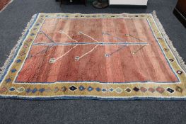 A fringed Persian village rug with central tree design CONDITION REPORT: 242cm by
