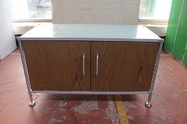 A contemporary metal double door office stationary cupboard