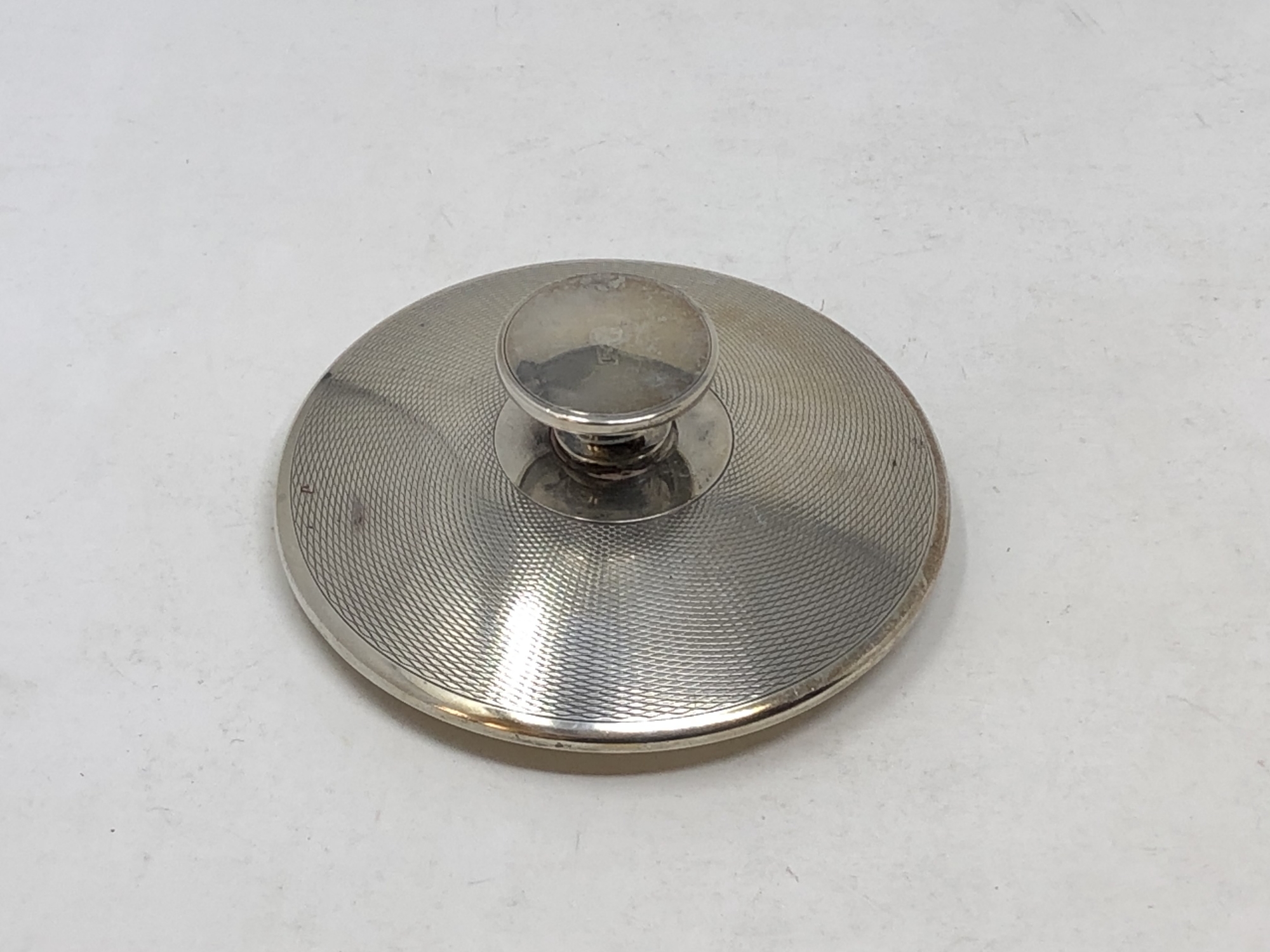 A silver pot lid, 49.5g.