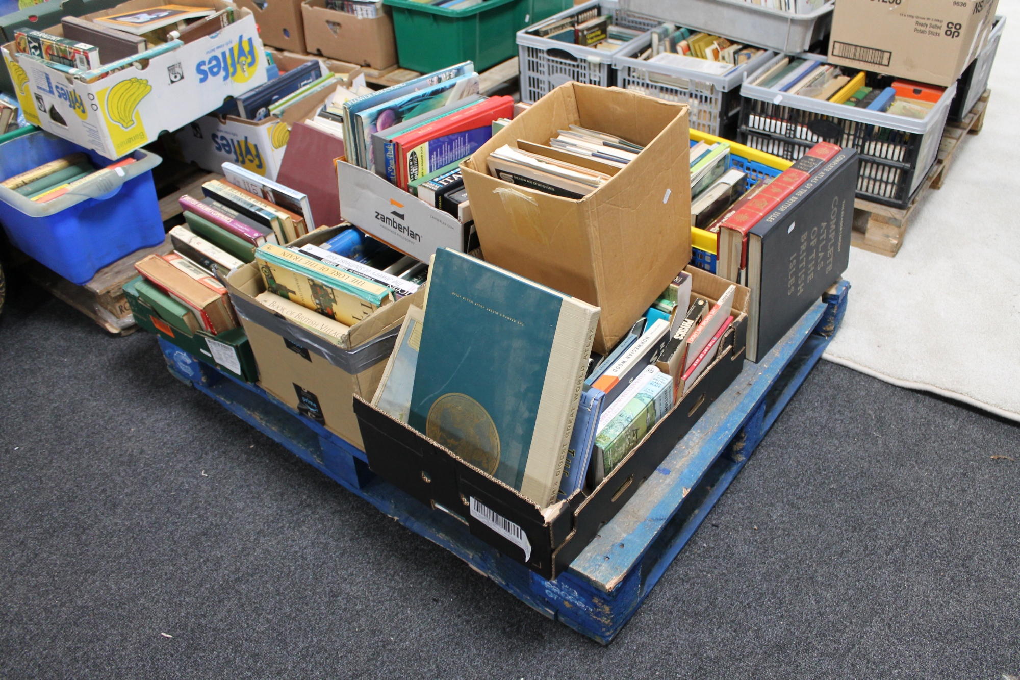 A pallet of hardback books, trains, cookery, novels, science,