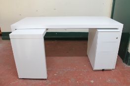 A white office L-shaped desk