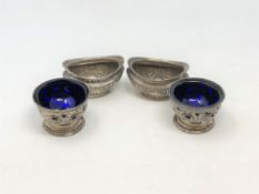 Two pairs of antique silver salts.