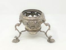 An early 18th century ornate silver kettle stand with burner, height 13cm.