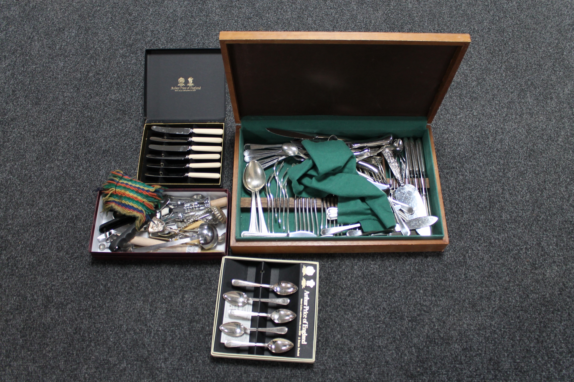 A teak canteen of plated cutlery, two boxed Arthur Price cutlery sets,