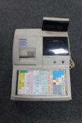 A Samsung SE 6500 cash register with key