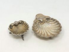 A Victorian silver gilt salt and a butter dish, each of shell pattern.