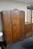 A 1930's oak single door wardrobe together with linen cabinet