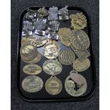 A tray of brass plaques, transport clubs and animal shows,