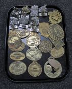 A tray of brass plaques, transport clubs and animal shows,