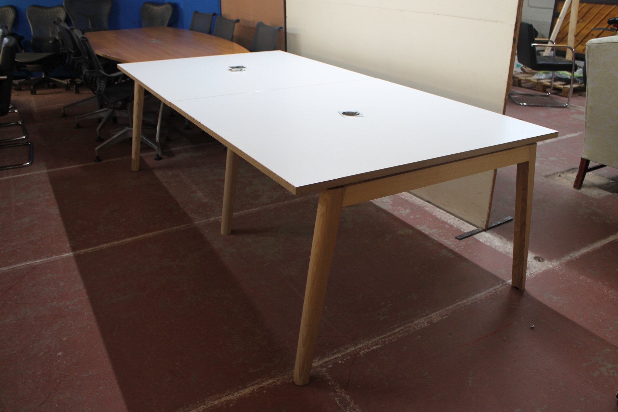 A twin section two-tone office table,