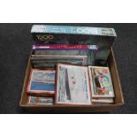A box of Victory wood and other jigsaw puzzles including The Cunard White Star Liner Queen