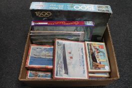 A box of Victory wood and other jigsaw puzzles including The Cunard White Star Liner Queen