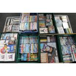 Eight plastic crates of DVD's