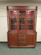 A Chinese carved hardwood display cabinet,