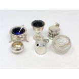 Two silver salts, two silver mustard pots, a silver egg cup,