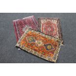 Three woolen Persian hearth rugs