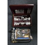 A part canteen of cutlery together with a tray of early 20th century plated wares, knife sharpener,