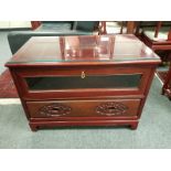 A Chinese carved hardwood entertainment stand,