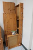 A pine triple door wardrobe with mirror door,