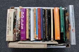 A box of 20th century hardback books relating to doll collecting