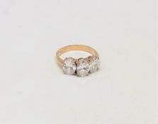 A 9ct gold three stone dress ring, size P. CONDITION REPORT: 3.9g.