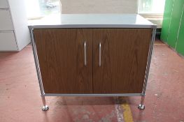 A contemporary metal double door office stationary cupboard