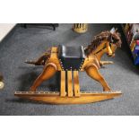 A 20th century pine rocking horse