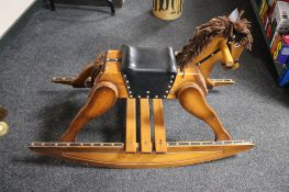 A 20th century pine rocking horse