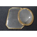 A hexagonal gilt framed bevelled mirror together with an oval gilt framed mirror
