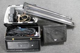 A Lamey CX amplifier together with two boxes of assorted stage lighting and cables